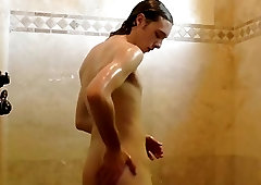 Twink uses his private time to stroke his massive hard penis