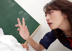 Mature Japanese woman in classroom takes control with handjob and creampie