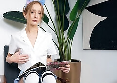 Tattooed babe Tea Mint is touching her wet shaved pussy