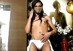 mysterious black femboy strokes her cock and touches juicy butt