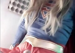 Estebel as Supergirl, milking and orgasming.