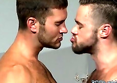 Stud sucks fat cock through gloryhole