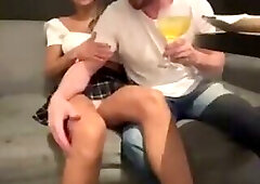 Married woman gets ready at the hotel bar while her cuckold watches