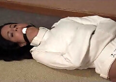 Kobe Lee in a MaxCita straitjacket
