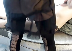 Femme fatale in stockings teases a submissive man before bringing him to climax
