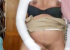 Small, luscious breasts of a transsexual expressing rich milk