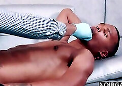 Black gay doctor examines his patient's asshole