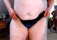 Stripped to the waist, big tits hairy pussy, thick and curvy