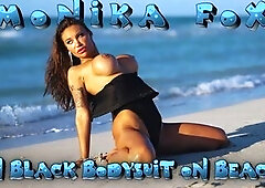 Hot Monika Fox in Ebony Bodysuit on Beach