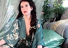 Busty curly brunette with big boobs fucks on couch