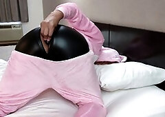 Steamy Asian model Cockyrocky shows off in a cute pink onesie and dark boxer trunks at a cheap motel
