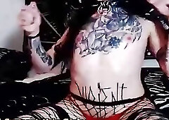 Tattooed Masturbating Tgirl Pleasures Herself