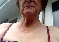 Mature beauty Betty Spanxxx enjoys some solo fun in the garden