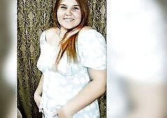 red-haired gal in a blue suit