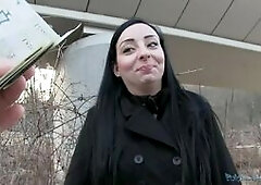 I saw this long black haired lady walking along side the road. She look like she loved rock music so I approached her and pretended to be a music vide