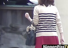 Hairy pussy Asian chicks caught on close-up spy cam pissing outdoors