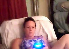 Beautiful bbw long hair brunette lifts up her mini dress and smokes cigarettes while playing games