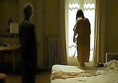 Leelee Sobieski stripped as that babe stands in front of a mirror and brushes her hair, showing her naked booty and boobs. From LIdole.