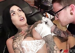 Nice-looking playgirl Janey Doe has her large boob tattooed