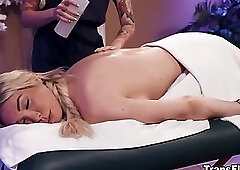 Parlor owner Charlotte Sins giving her client Aubrey Kate a massage