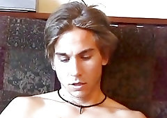 Naked guy masturbates over a towel so he can see his jizz