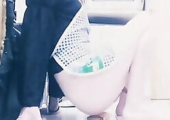 Housewife in apron fucking the dildo