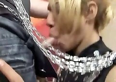 Submissive tranny is chained and fucked by an older dude