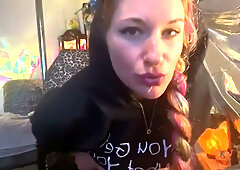 Solo girl in fishnets teases on cam before devouring her creampie