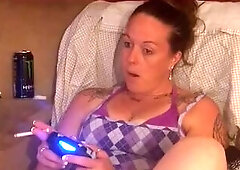 Nice-looking mother I'd like to fuck playing fortnite and smokin' cigarette lets me film up her purple mini petticoat (part three)