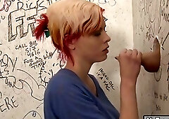 Female sucks tranny cock through gloryhole and then gets drilled