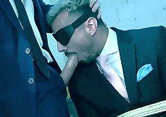 Bleached blond lad removes the blindfold and serves