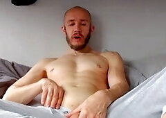 Handsome hunk indulges in a tantalizing session with his impressive manhood and hefty testicles