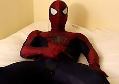 spiderman wanks off and jizzes all over his suit