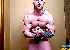 Massive Muscle God Flexes Hard Muscles Up Close