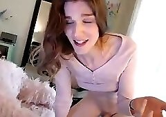 Brunette tgirl spanks own ass