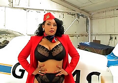 Confident British MILF stuns in erotic aviation uniform during solo hangar session