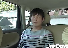 Japanese twink jerks off and cums big loads in the backseat