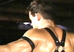 S & M gays do some hard fisting before he slides it in his butt