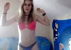 Beautiful blonde shemale strips naked to vigorously jerk herself off