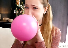 Curvy Russian Ivi Rein plays with latex balloons during a steamy casting session