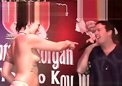 Babes strip down during a wet t-shirt contest at a wild party