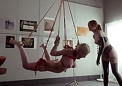 Submissive bondage puppet Rebel Rhyder sucks cock and eats ass in a demented threesome game
