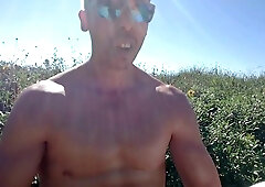 Muscled man public onanism at a well-liked park. People passing by...interrupting him! RISKY!!!