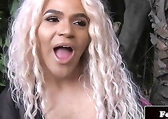 Dashing blonde shemale teases with her big fat boner outdoors