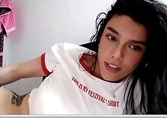 Watch her stroking her pink shaft in front of the camera