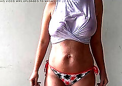 Witness this outstanding sexy wife get her flawless breasts soaked in this braless white shirt. Those are the superlatively good melons u will watch