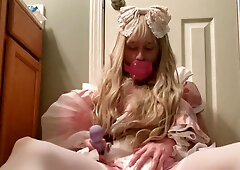 Sissy trying to get off in her rosy nappy with a massager