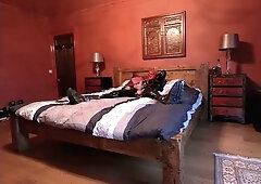 British couple shares intimate latex-dressed moments on webcam during holiday