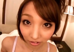 Classy buxomy oriental Erina is stretched by an amazing sex toy