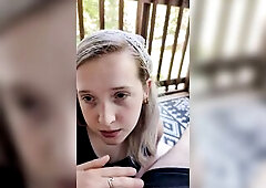 Blond chick gives head on the patio